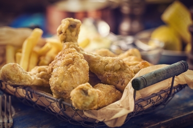 an image of chicken drumbsticks in a basket